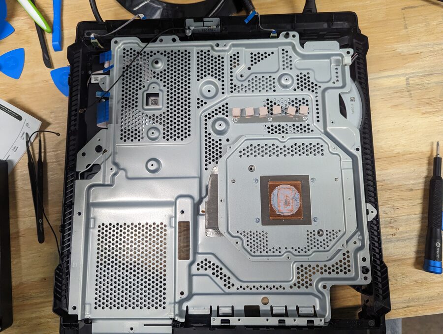 Console APU being repasted with fresh thermal compound