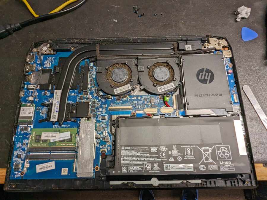 Laptop opened for internal cleaning and repair